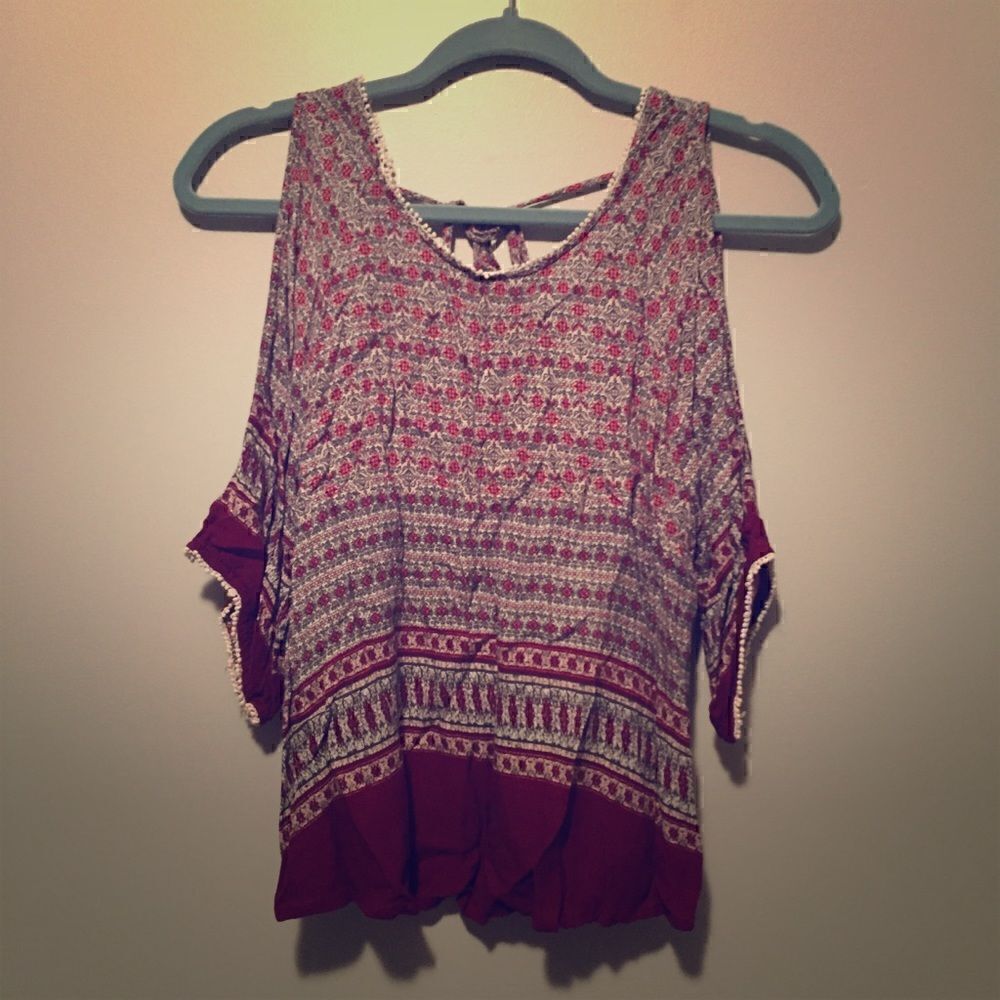 Open shoulder, low back, paisley top.